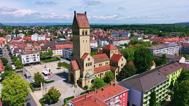 Aerial view of the city of Singen with the Roman Catholic Sacred Heart Church, foundation stone laid in 1909, completed 1911, on the horizon the Hegauberge with the Hohentwiel and Germany's largest f