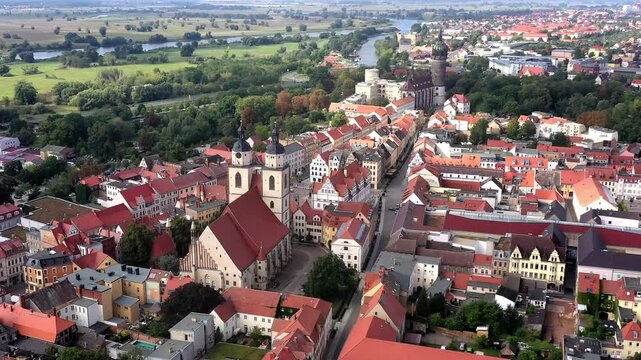 Drone shot, drone video, drone flight, aerial view, flight over the historic old town with half-timbered houses, St. Marien zu Wittenberg city church and castle church, Elbe, Luther city Wittenberg, 