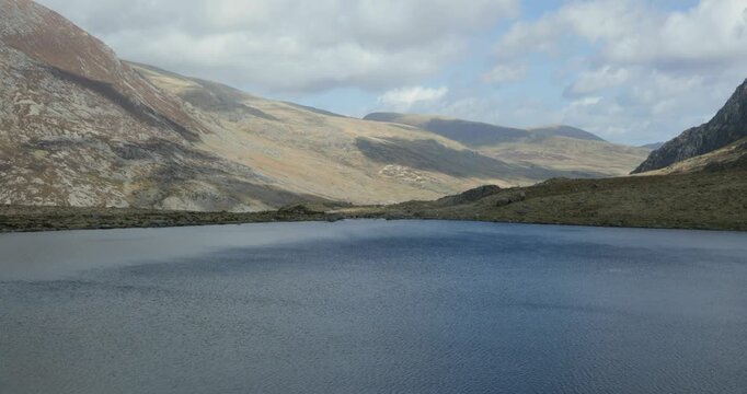 Wind blowing across the lake Llyn Idwal, Pont Pen-y-benglog, Bethesda, Bangor, Wales, United Kingdom
