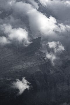 Rocks in fog, mountain landscape with dramatic clouds, Bernese Alps, Bernese Oberland, Switzerland