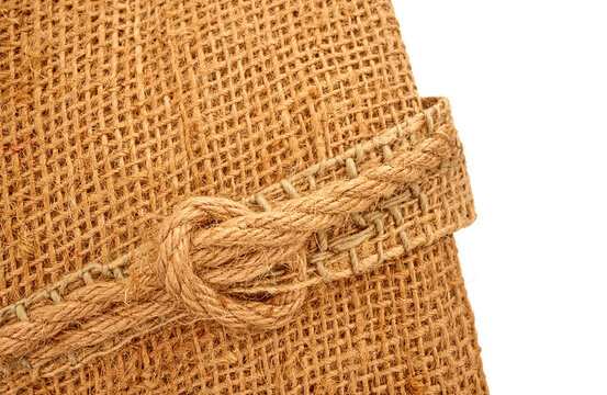 Close up detail of a tied rope knot on a burlap sack bag isolated on transparent background