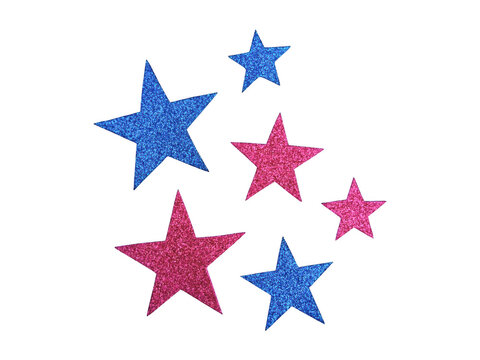 Assorted blue and pink glitter star shapes arranged on a plain black background, festive decorative for crafts and holiday party themes