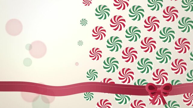 Gift wrapping paper with peppermint swirls close-up endless loop