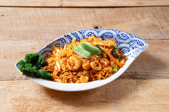 Gourmet Thai seafood fried rice known as Khao Pad with shrimps, squids