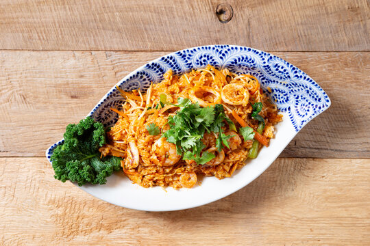 Gourmet Thai seafood fried rice known as Khao Pad with shrimps, squids