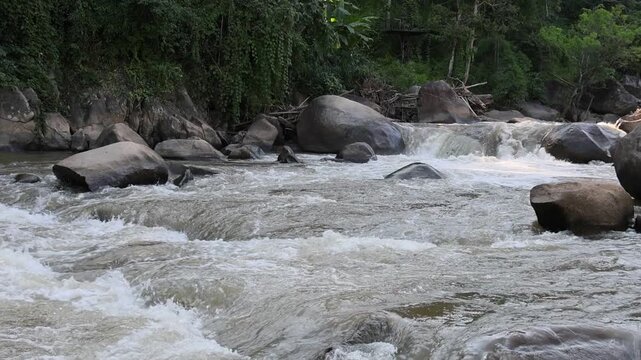 Mountain River Flowing Water Around Granite Boulder Through Tropical Forest, Rocky Landscape With Whitewater Rapids, Powerful Stream, Rugged Natural Scenery And Tranquil Woodland Views