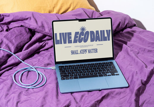 Mockup Template of Laptop Screen on Purple Bed Sheets