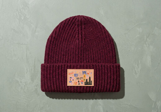 Mockup Template of Leather Patch on Burgundy Beanie