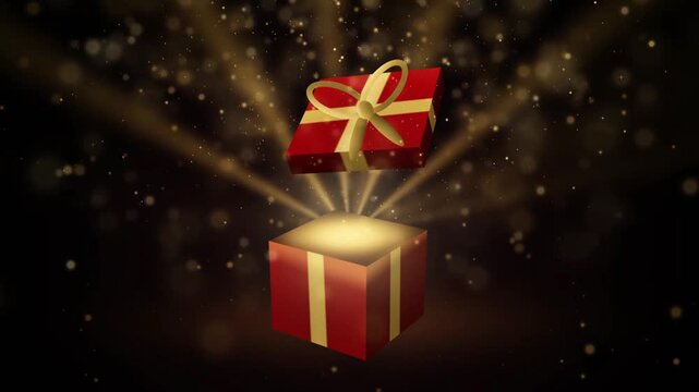 Exploding gift box. A box bursts open in slow motion, releasing gold particles