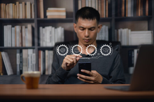 Young man engaging with digital interface and futuristic icons in library setting