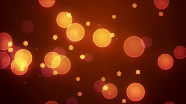 Warm Golden Bokeh Lights Drifting Softly on Dark Amber Background