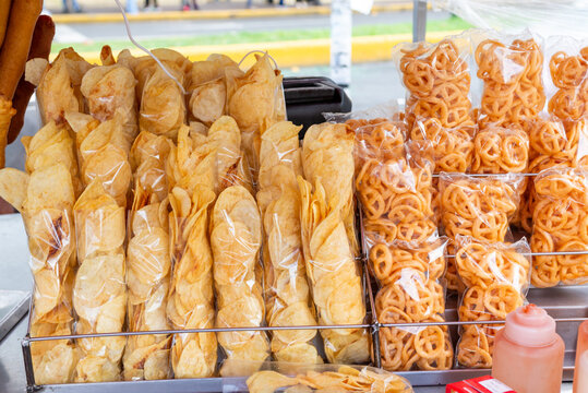 Plastic Bags Filled with French Fries and Duritos at a Mexican Street Food Stall