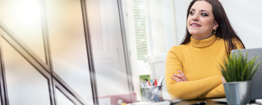 Businesswoman working from home; multiple exposure