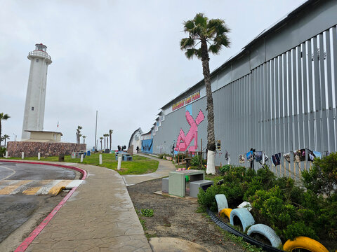 Tijuana, Baja California, Mexico - Mar 14, 2025: Tijuana beaches, a popular coastal border area where the wall with the U.S. is located, the boardwalk, seafood restaurants and culture