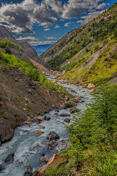 Scenic view of torres del paine national park with snow-capped mountains and blue lake in patagonia
