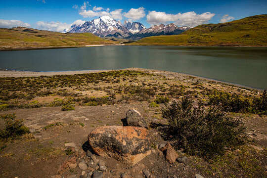 Scenic view of torres del paine national park with snow-capped mountains and blue lake in patagonia