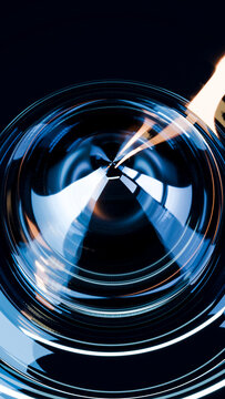 Close-up abstract illustration of glass and candle flame reflections