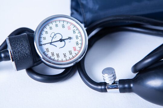 Blood pressure meter and stethoscope on a white background. Toned.