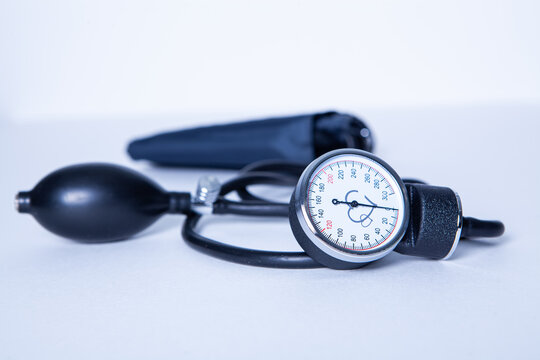 Blood pressure meter and stethoscope on a white background. Toned.