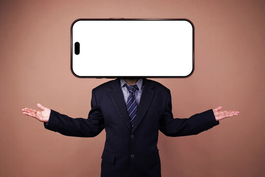 Businessman with Blank Smartphone Head Presenting Open Palms Gesture Against Brown Background