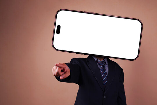 Man in Suit Pointing Forward with Empty Smartphone Screen Replacing Head on Brown Background