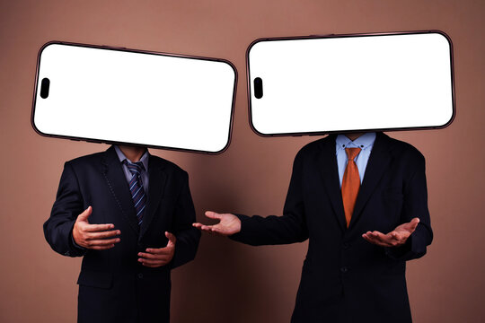 Two Men in Suit Gesturing with Open Palms and Blank Smartphone Screens Replacing Heads