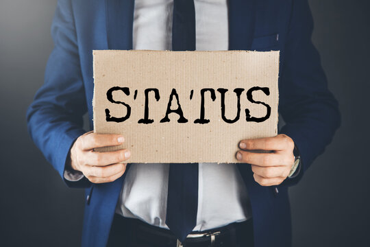 STATUS concept word on paper