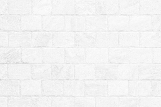 Kitchen wallpaper concept: Close up modern white brick tiles wall texture background, White brick wall texture background for stone tile block in grey light color wallpaper modern interior.