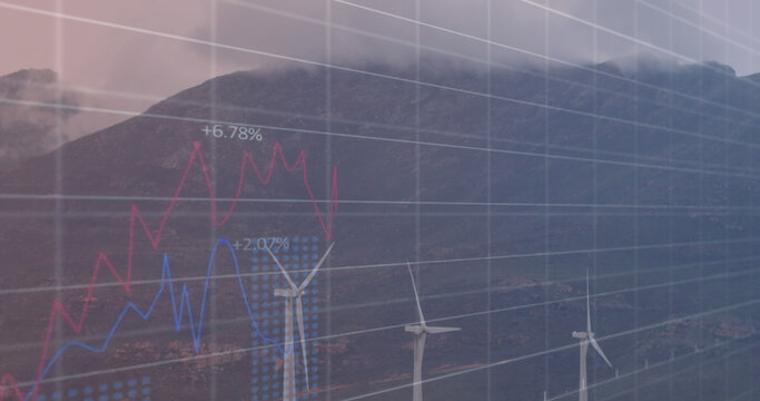 Image of statistical data processing over spinning windmills against mountains