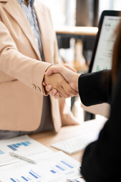 Vertical Close Up of Businesswomen Handshake in Office Meeting