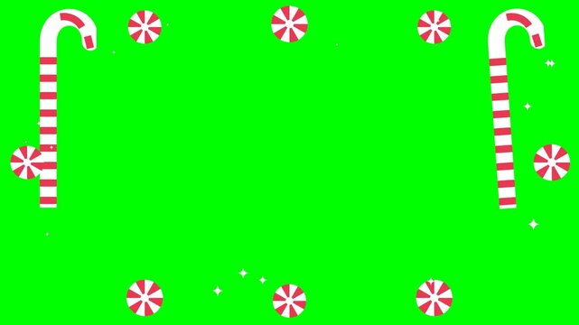 Candy canes and peppermints frame seamless loop on green screen