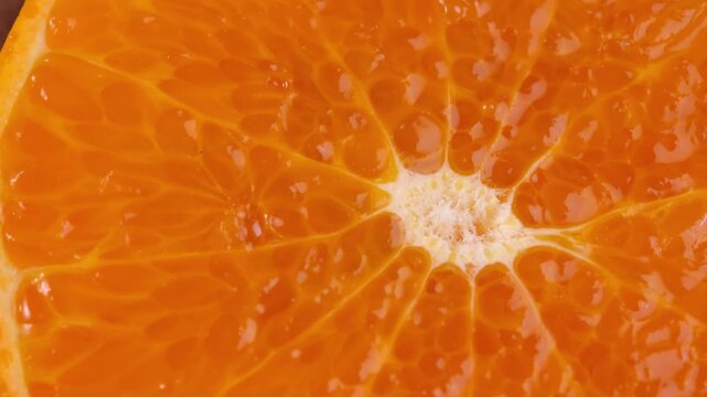 Rotation of orange slices. View from above.