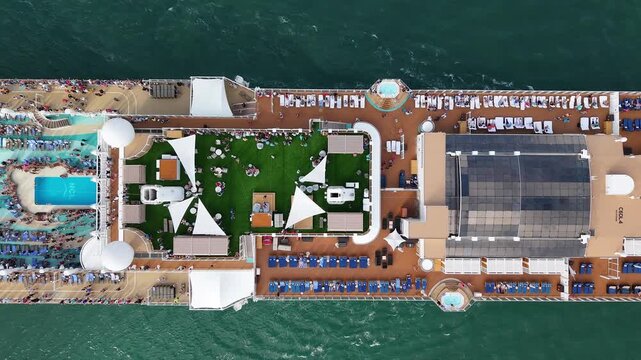 Miami, Florida, USA - March 30, 2025: Cruise summer vacation. Norwegian cruise line. Cruise ship tour, top view. Ship leaving Miami beach port. NCL. Travel by sea. Norwegian cruise ship voyage
