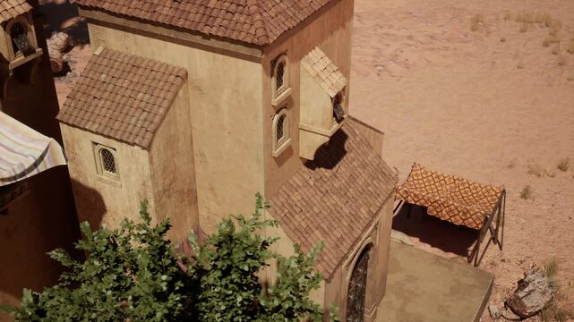 A quaint building with a textured surface and charming architecture stands in a warm desert landscape. Nearby, a shaded area offers respite from the sun, inviting visitors to relax.