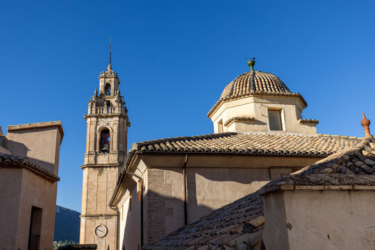 Plaza de la Constituci&oacute;n with the Church of Our Lady of the Assumption in Biar, Alicante (Spain), bathed in morning light