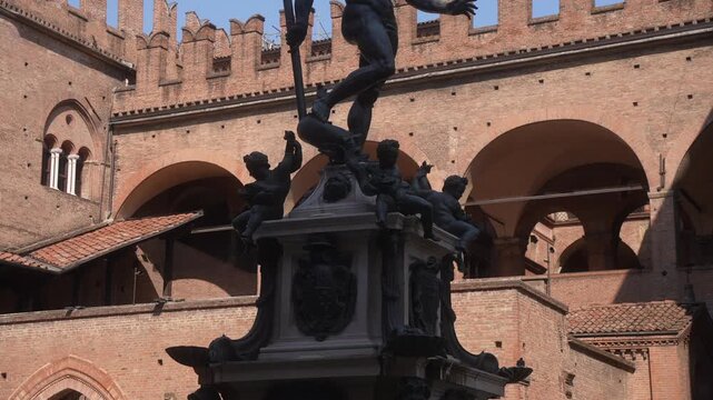 View of Neptune's Fountain in Piazza del Nettuno on a sunny day in Bologna, Emilia-Romagna, Bologna, Italy