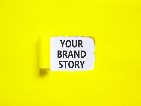 Branding and your brand story symbol. Concept words Your brand story on beautiful white paper. Beautiful yellow paper background. Business branding your brand story concept. Copy space.