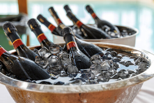 Champagne Bottles Chilling in Ice Bucket, Elegant Sparkling Wine for Celebration, Wedding, Party, and Luxury Event