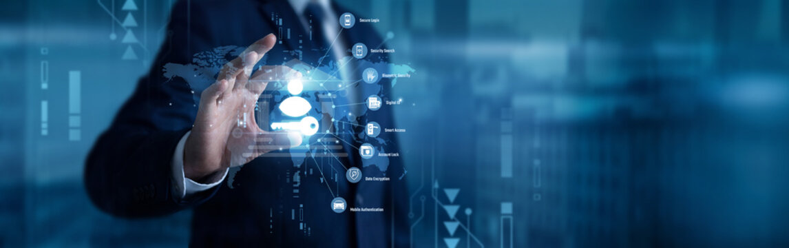 A security admin hand raised and fingers are touching a glowing Identity and Access digital network verifying encrypted user credential. Protecting secure system entry .