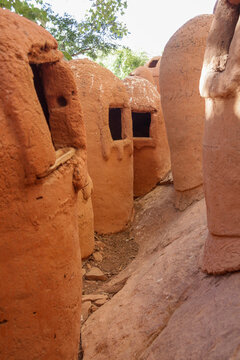 Clay granaries with small openings in the Abandoned Troglodyte Village, Cascades Region, Niansogoni, Burkina Faso