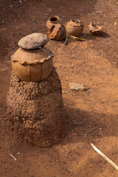 Lobi tribe fetish made of a clay pot with a stone lid on a mud cone, Sud-Ouest Region, Gaoua, Burkina Faso