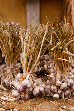 Garlic sits for sale at a market