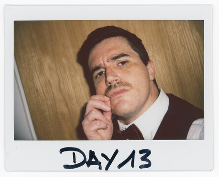 Man With Moustache Takes a Selfie on Day 13 of a Project