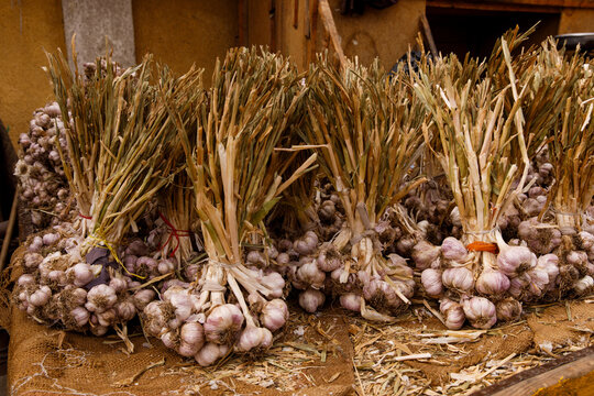 Garlic sits for sale at a market