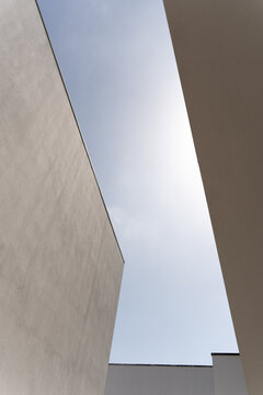 Minimalist architecture framing the blue sky