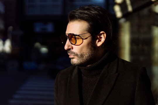 Man in amber tinted Sunglasses