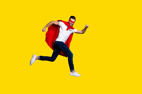 Full length body size view of his he nice-looking attractive content cheerful cheery glad virile masculine sportive macho bearded guy running marathon isolated over gray pastel background