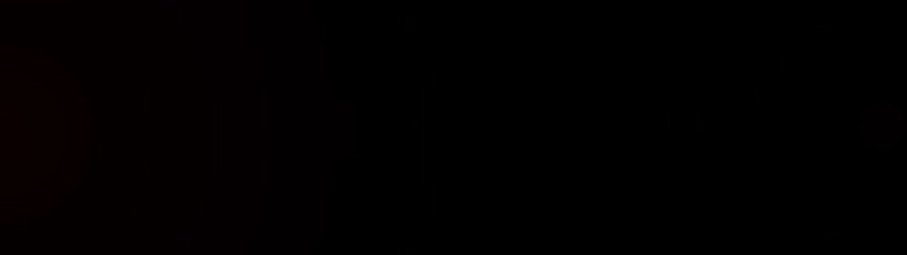 Intense red light beam streaks across dark space, particles and orbs scattered, dynamic energy effect.Explosive light burst erupts from the center. Radiating rays stretch outward rapidly