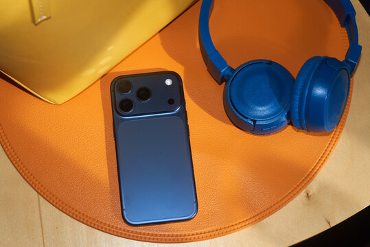 Phone placed on a orange placemat