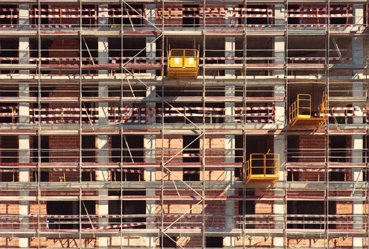 Yellow Platforms Among Scaffolds